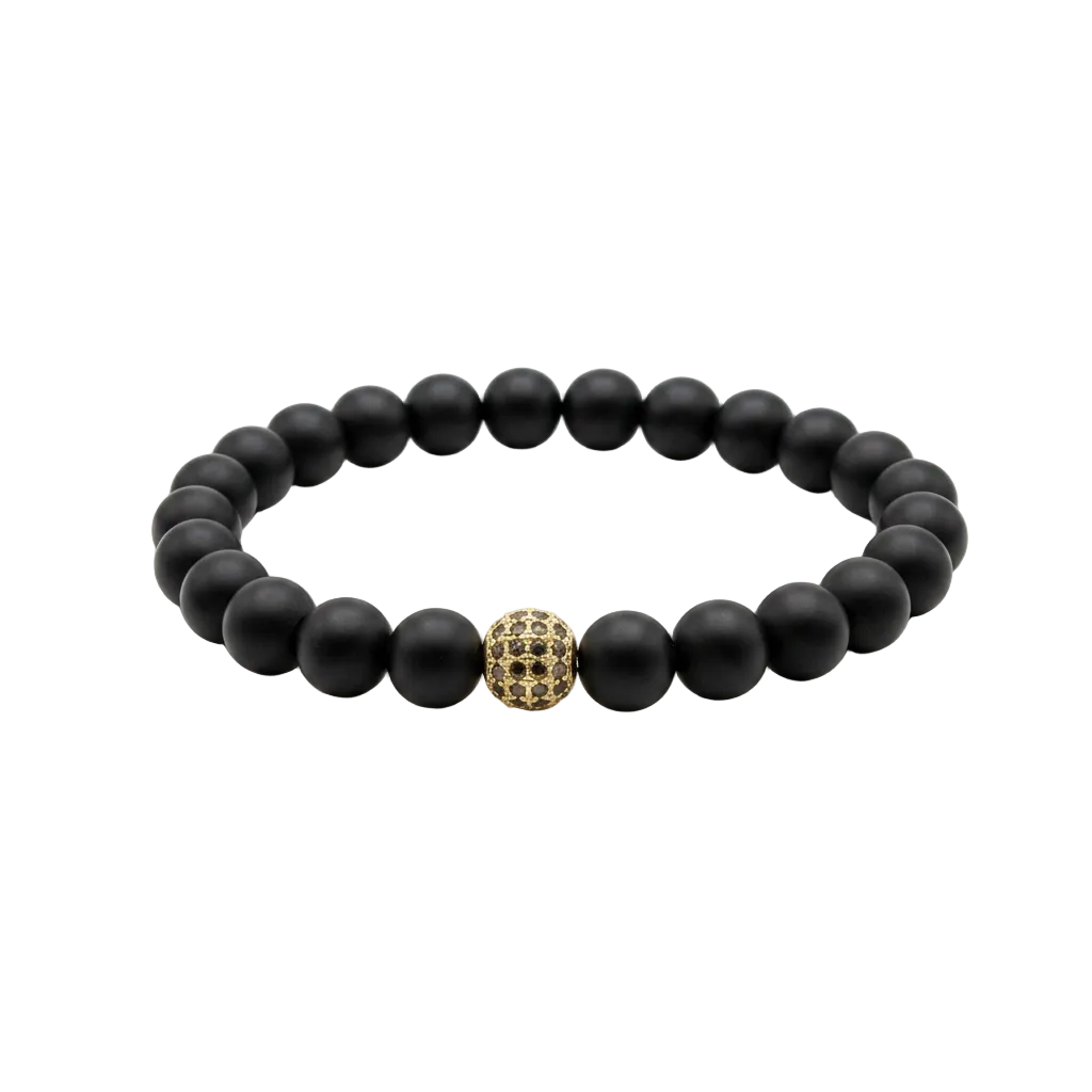 A beaded stretch bracelet featuring matte black round beads and a central gold-toned textured accent bead, displayed on a clean white background.